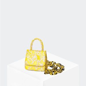 House of Want Newbie Baby Micro purse in Citrine